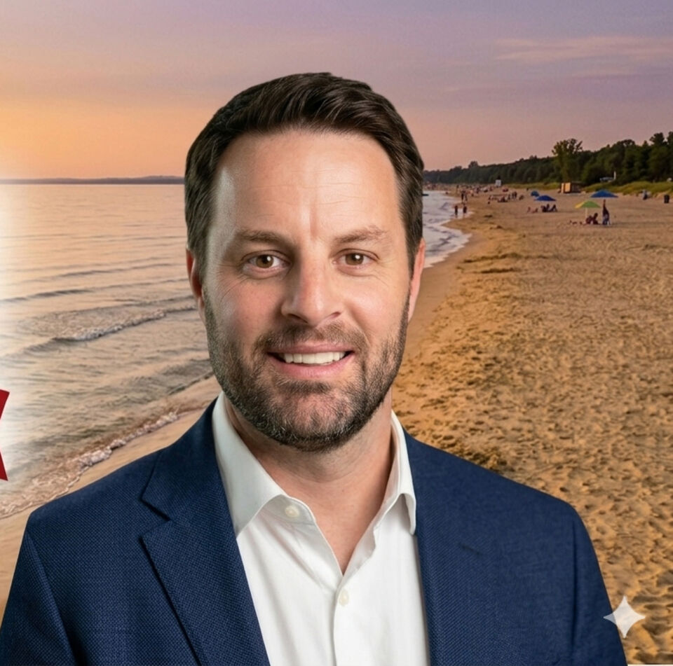 Dan Gale, candidate for Wasaga Beach Town Council, on the beach at sunset